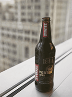 bottle of beer on window sill
